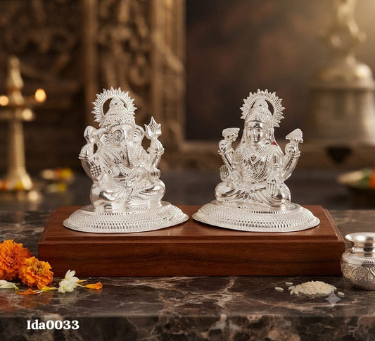 Lakshmi Ganesha Idols seated on oval base