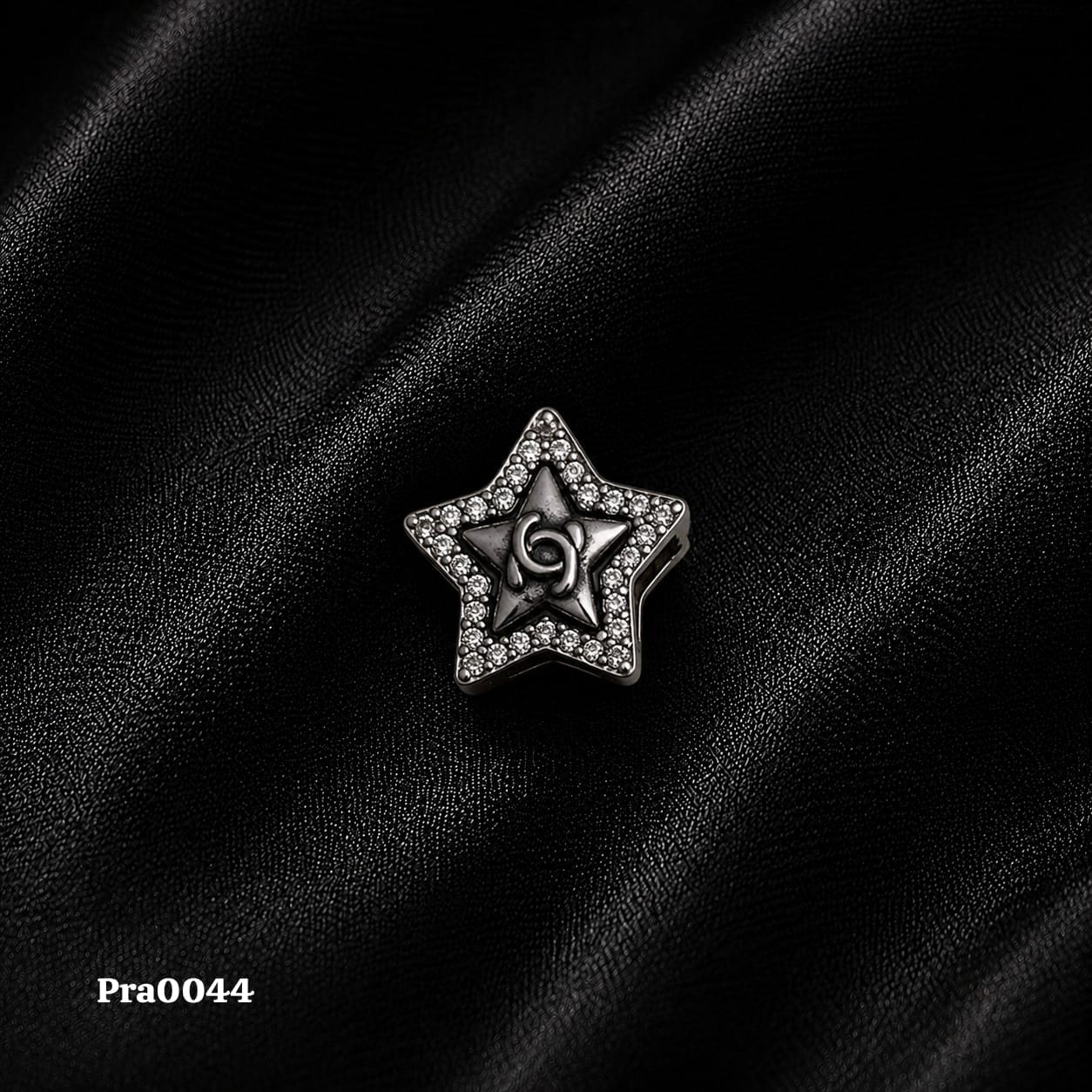 Emblematic Star Charm