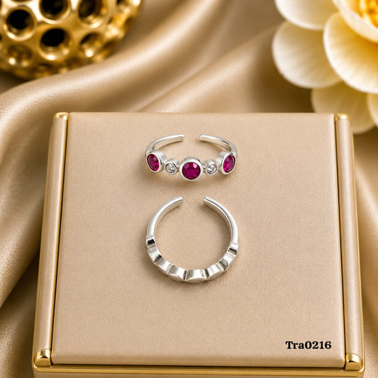 Alternating bezel-set round red stones Silver Toe Rings