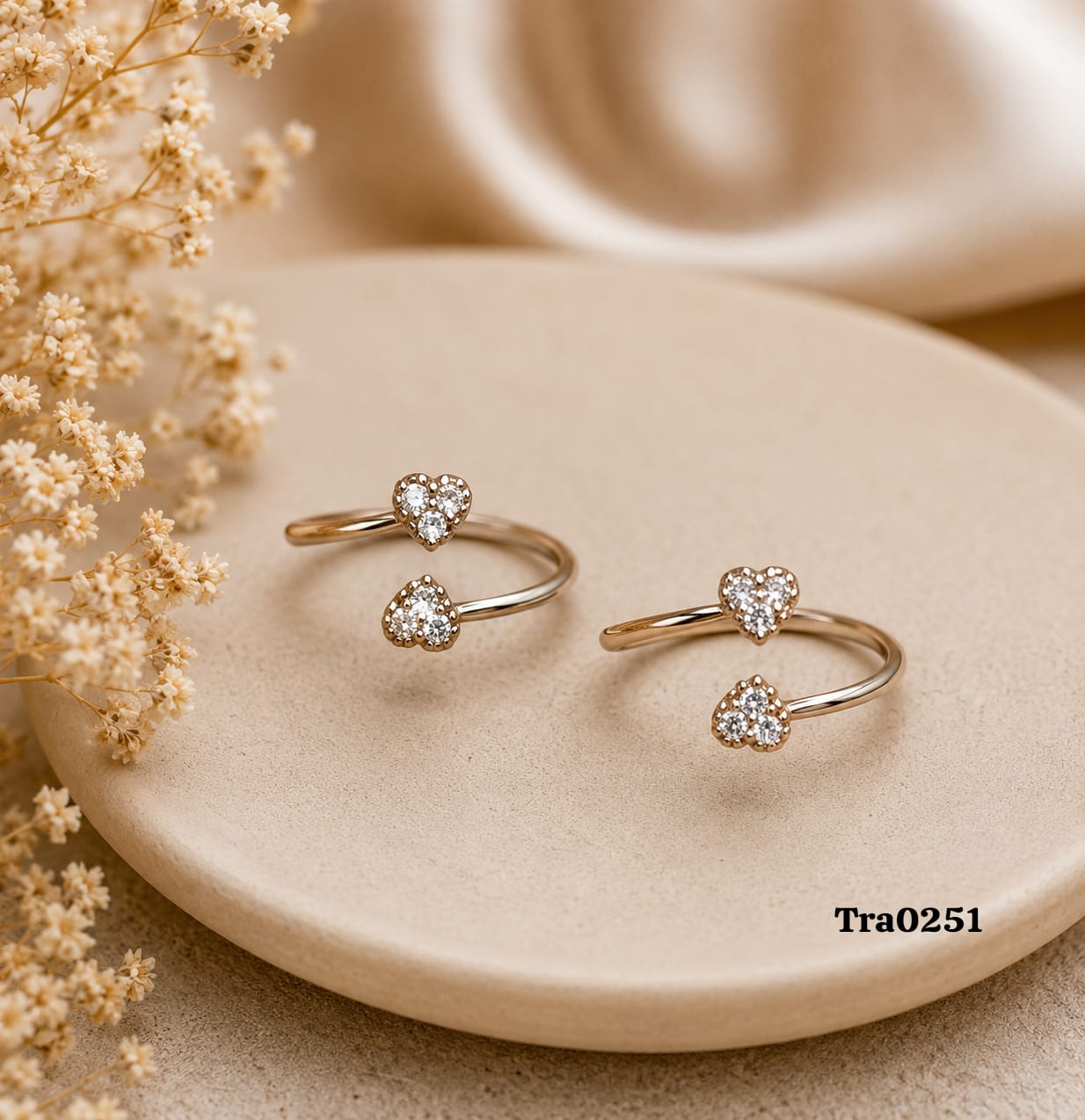 Silver Toe Rings with heart-shaped centerpiece encrusted with three clear, sparkling stones
