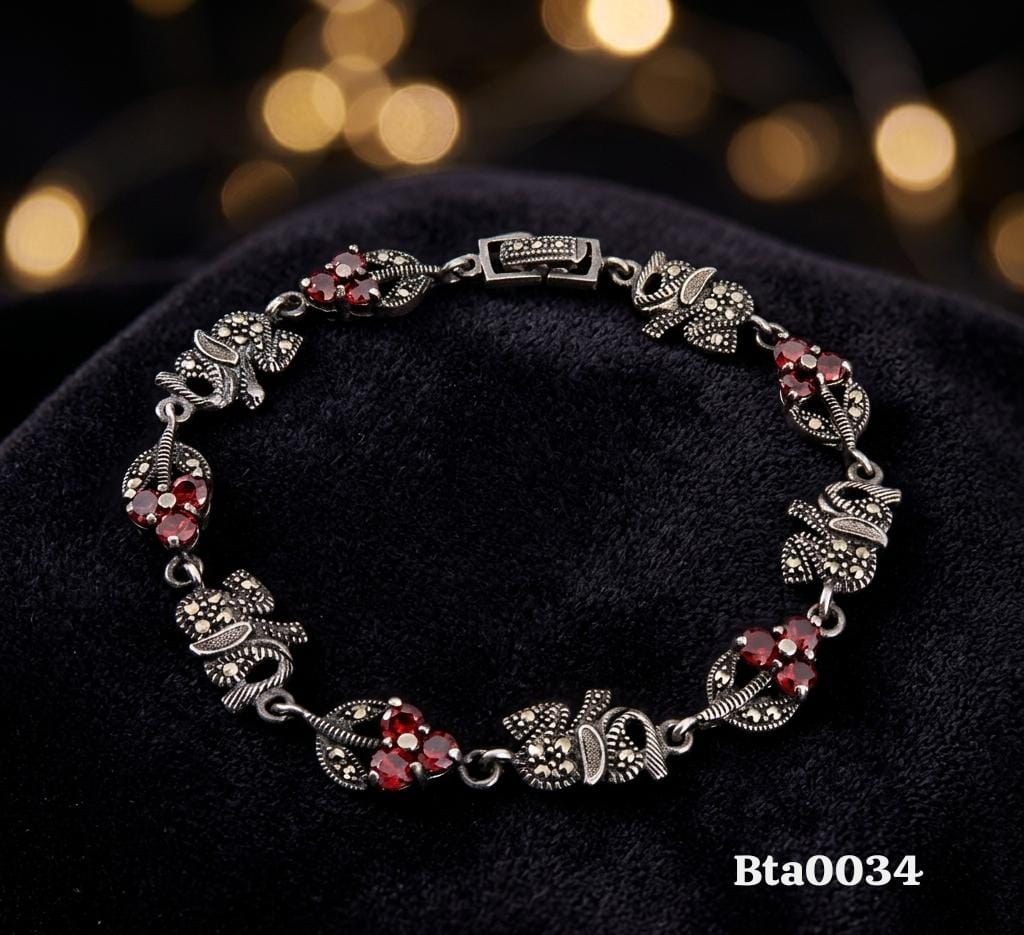 Elegant Elephant Motif Red Gemstone Marcasite Bracelet