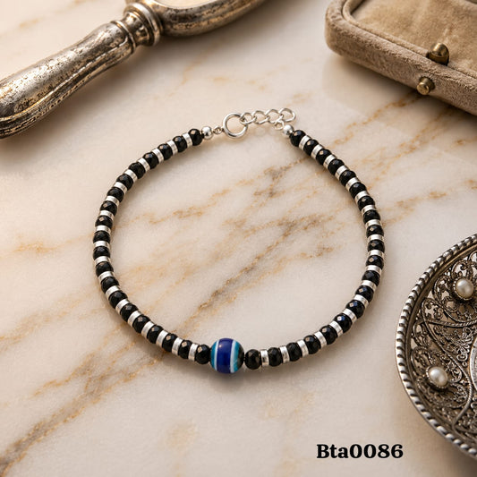 Elegant Sterling Silver, Black Bead & Evil Eye Charm Bracelet