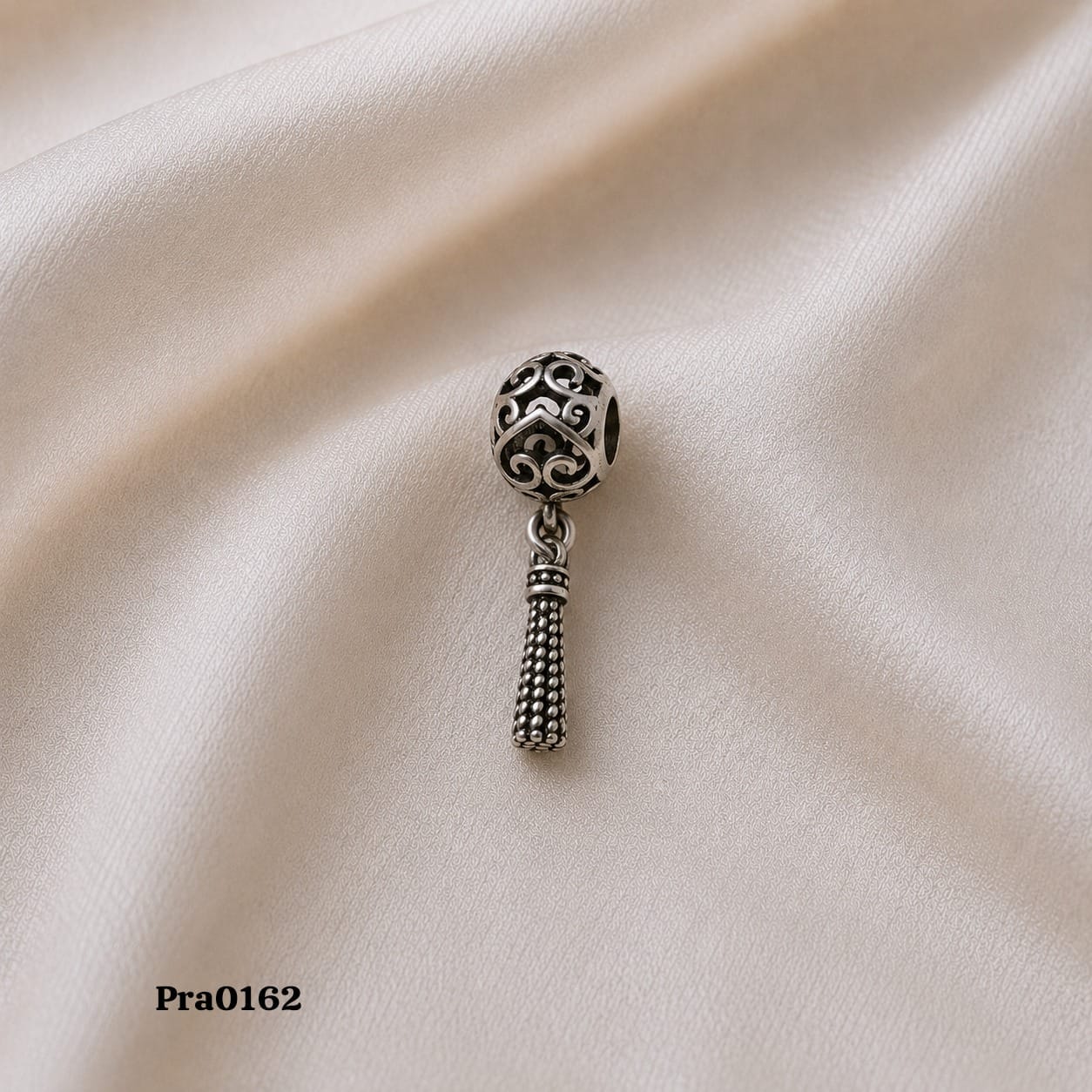 Ornate Filigree" Tassel Charm