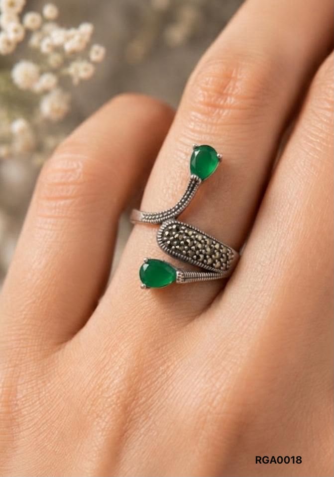 The Emerald Green Bypass Ring