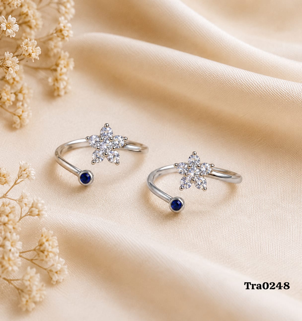 Flower-Shaped Centerpiece Silver Toe Rings - Deep Blue Stone Accent
