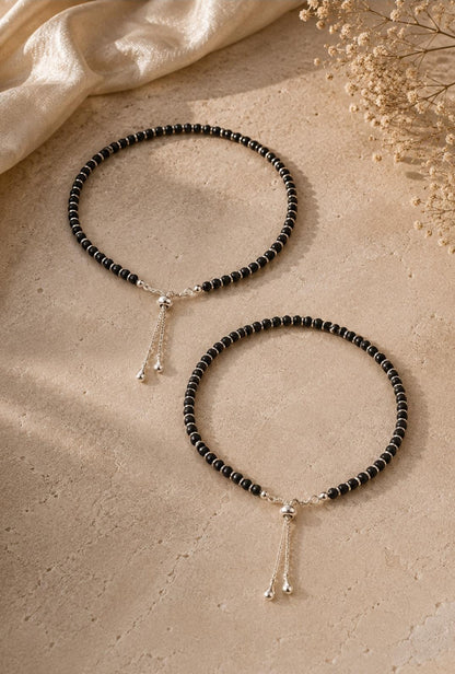 Anklet with black beads and silver spacers